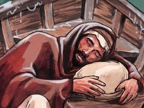 W tym czasie Jezus spał w tyle łodzi. – Slajd 4