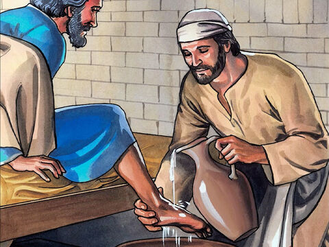 Potem nalał wody do misy i zaczął myć nogi swoim uczniom i wycierać je ręcznikiem. – Slajd 6