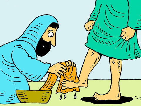 Jezus uklęknął i zaczął delikatnie obmywać ich brudne stopy, a następnie osuszać je ręcznikiem. – Slajd 4